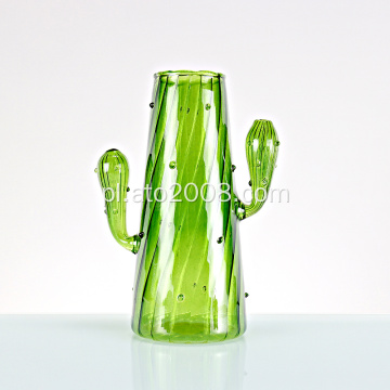 Zielony szklany wazon kaktusowy.